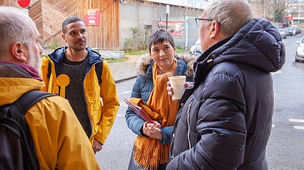 Liberal Democrat activists Doug Buist and Chris French with London Assembly Member Caroline Pidgeon in Waterloo