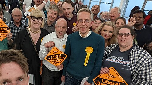 Lib Dem activists celebrate winning council seats at Kia Oval in the local elections 2022